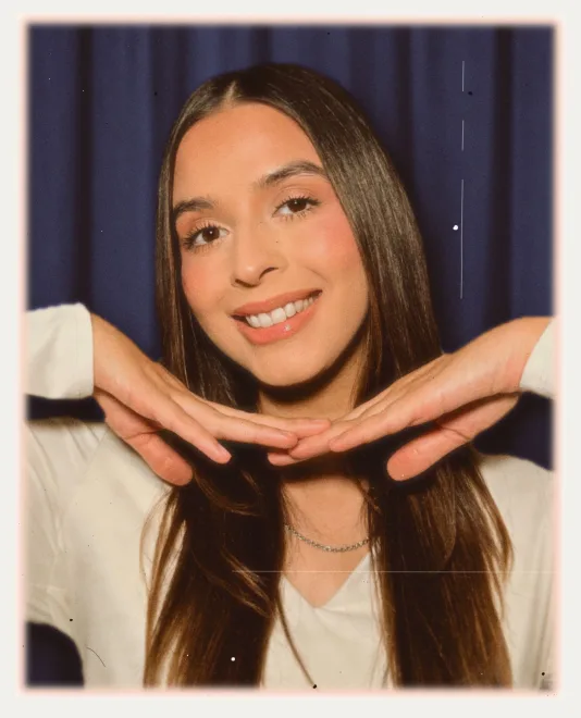The print with a blue curtain backdrop